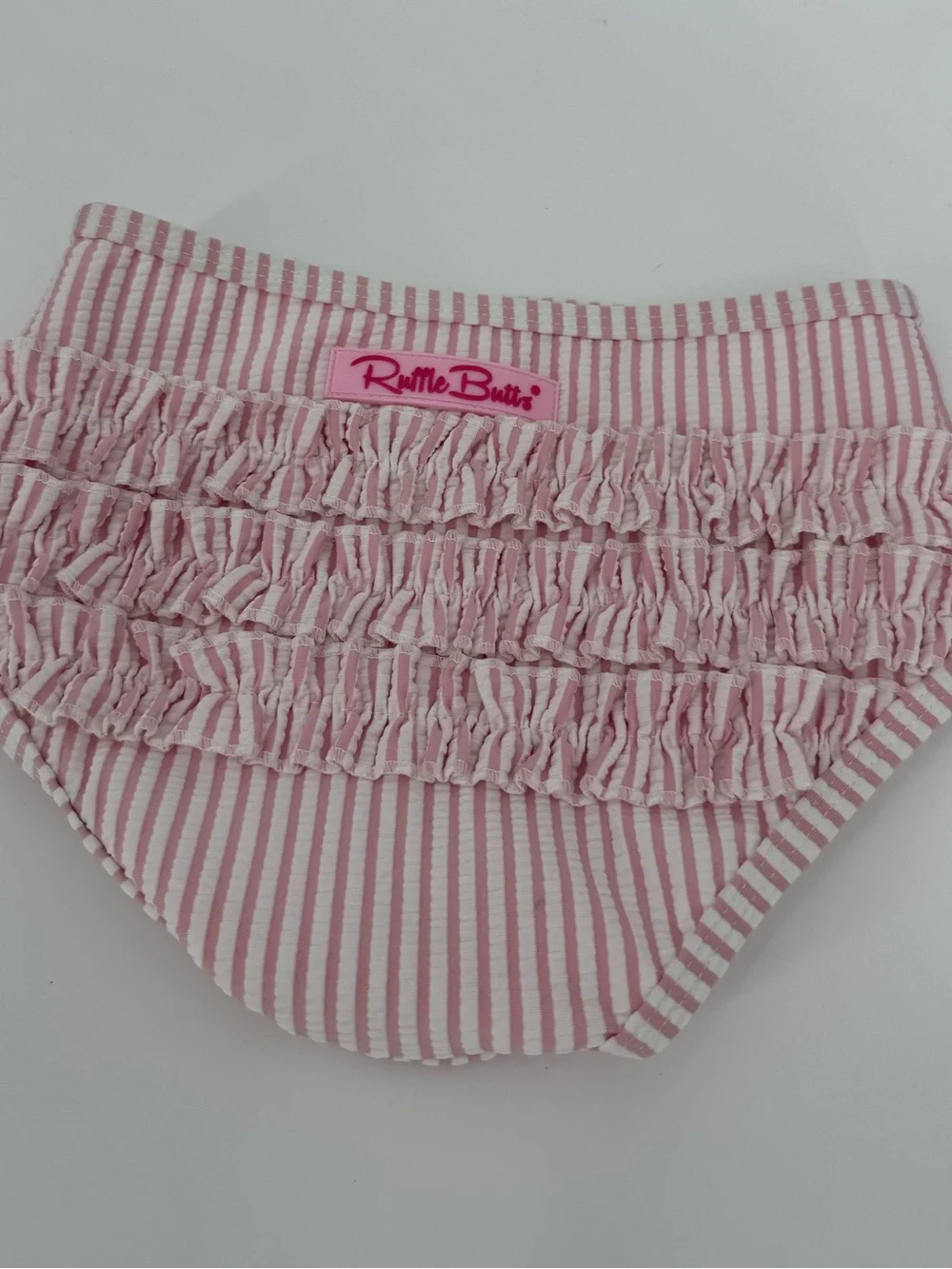 RuffleButts Girls Seersucker Ruffle Swim Bottom | Pink Stripe | 3T